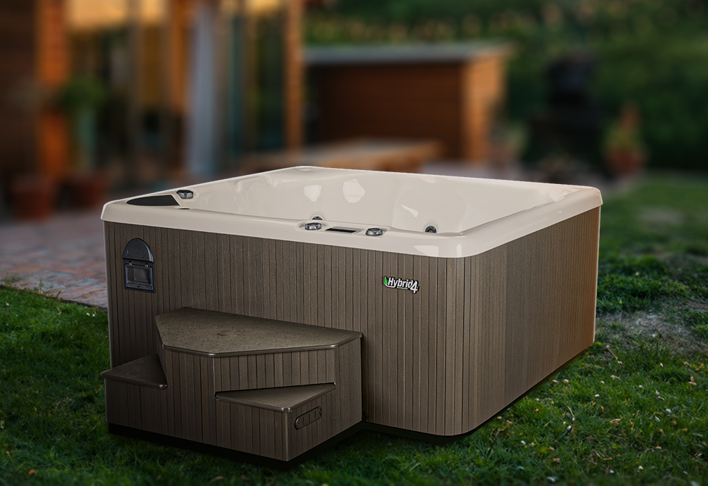 beachcomber hybid4 hot tub with opal acrylic sitting on green grass